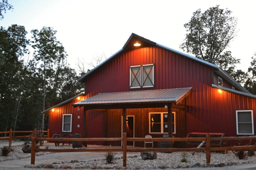 Lodge side angle at dusk with porch lights