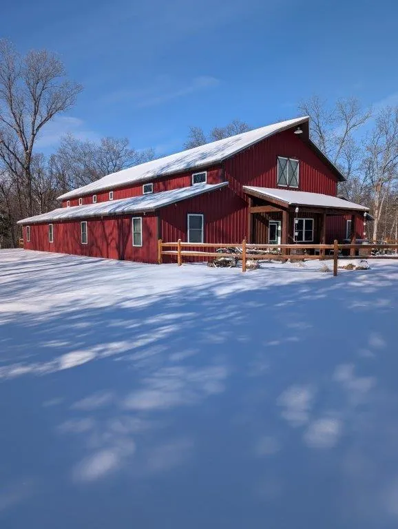 Lodge in winter snow with blue sky