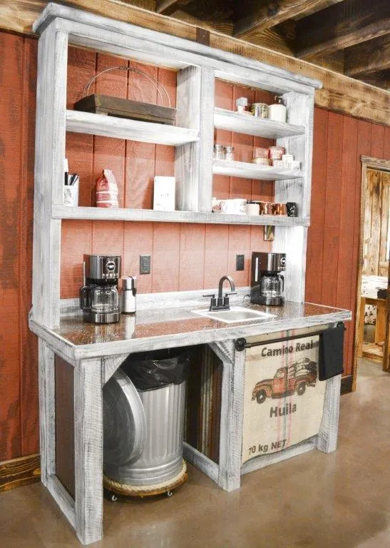 Coffee bar station with coffee makers and whitewashed hutch