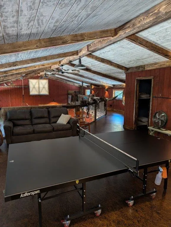Loft ping pong table and sofa area